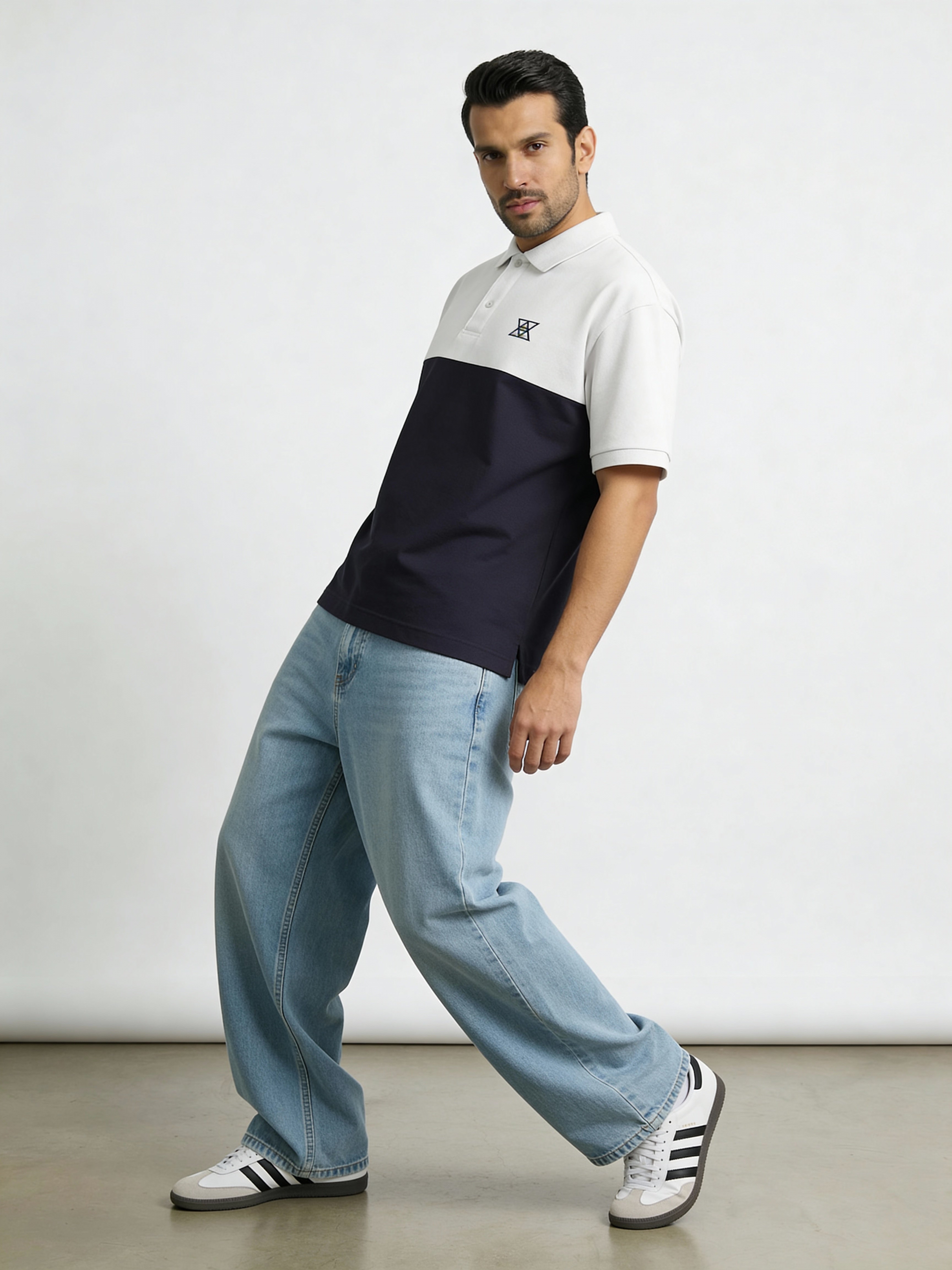 Contrast Oversized polo with unique collar branding