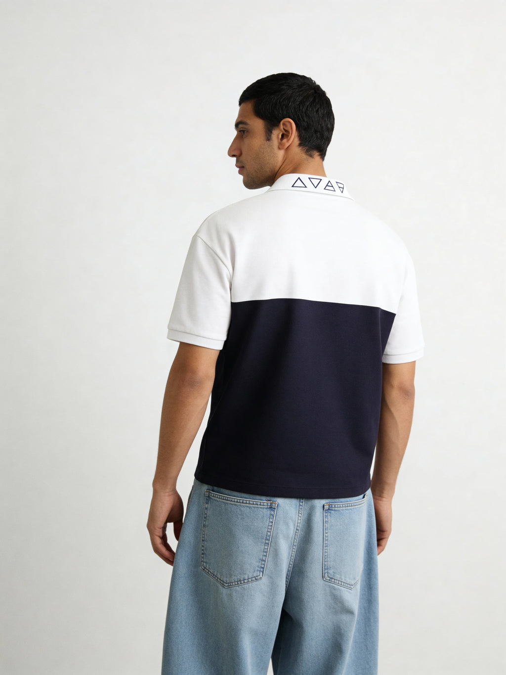 Contrast Oversized polo with unique collar branding