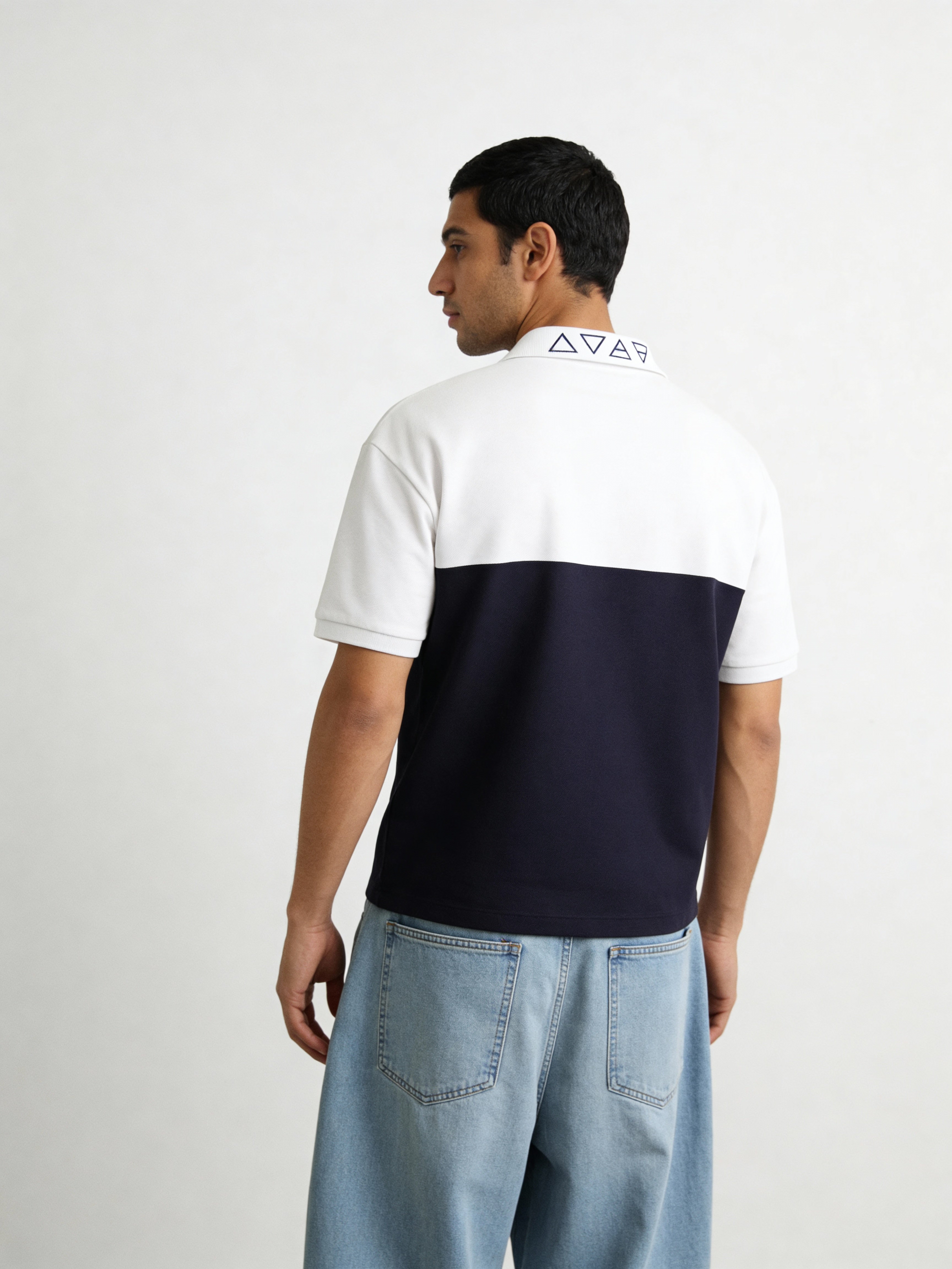Contrast Oversized polo with unique collar branding