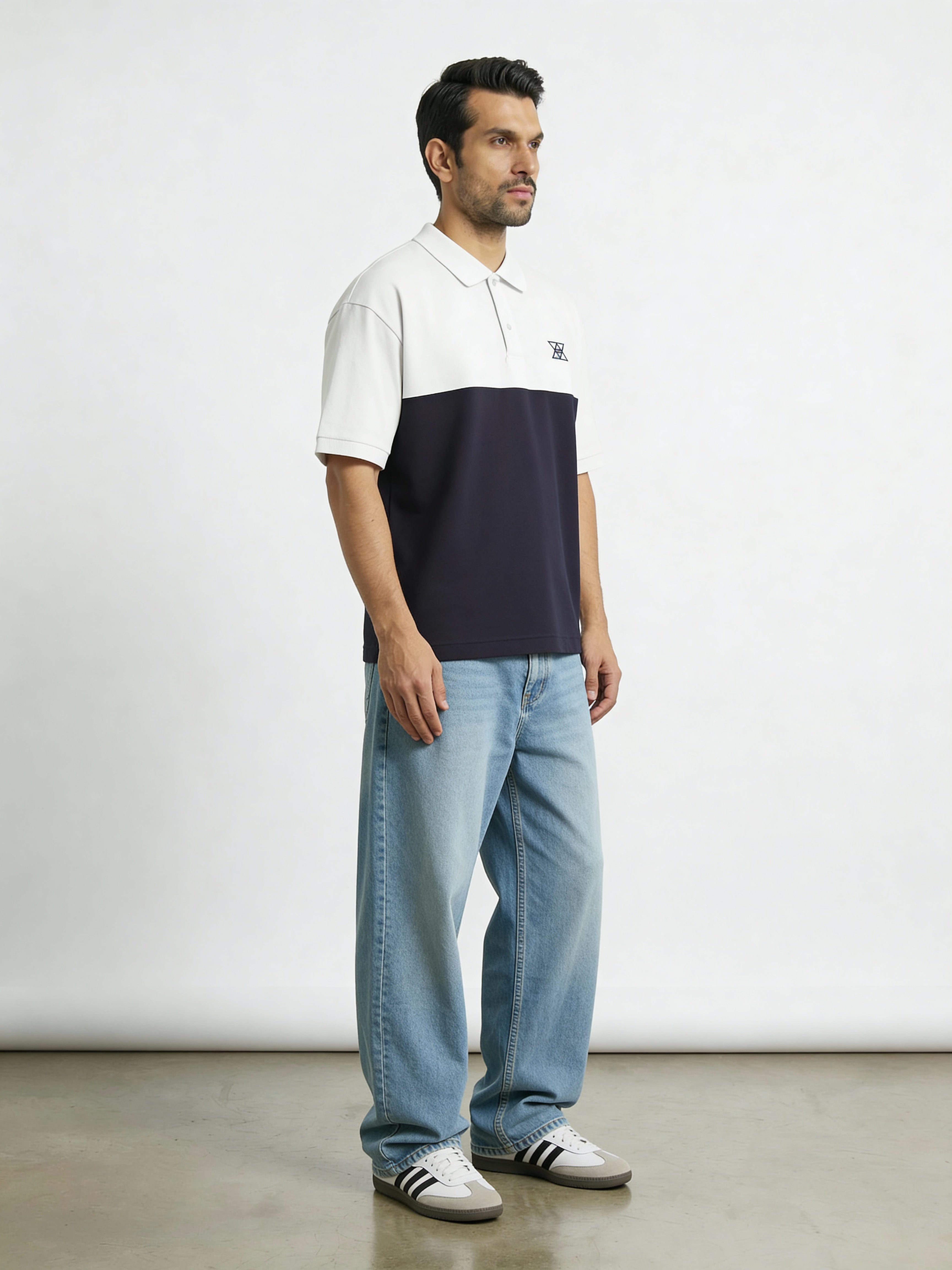Contrast Oversized polo with unique collar branding